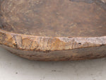 An exceptionally large antique burr elm bowl carved from one piece of wood