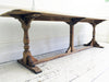 A 9' Bleached Oak Early 20th C Long Trestle Dining Table