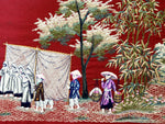An Antique Framed Chinese Embroidery Panel of a Ceremonial Procession on Burgundy Silk