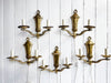 A Set of Five Antique Brass Wall Lights - sold in pairs