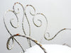 An Elegant Pair of Painted White Wrought Iron Garden Chairs