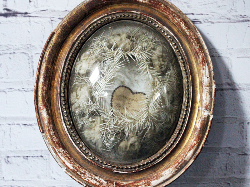 An Antique French White Flower Garland in Gold Domed Glass Frame