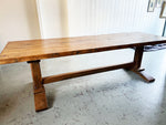 An early 20th Century French Oak Trestle Table