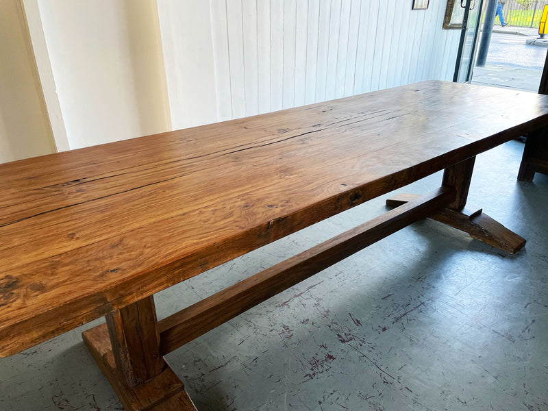 An early 20th Century French Oak Trestle Table