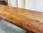 An early 20th Century French Oak Trestle Table