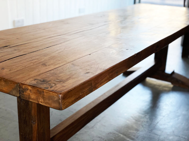 An early 20th Century French Oak Trestle Table