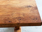 An early 20th Century French Oak Trestle Table