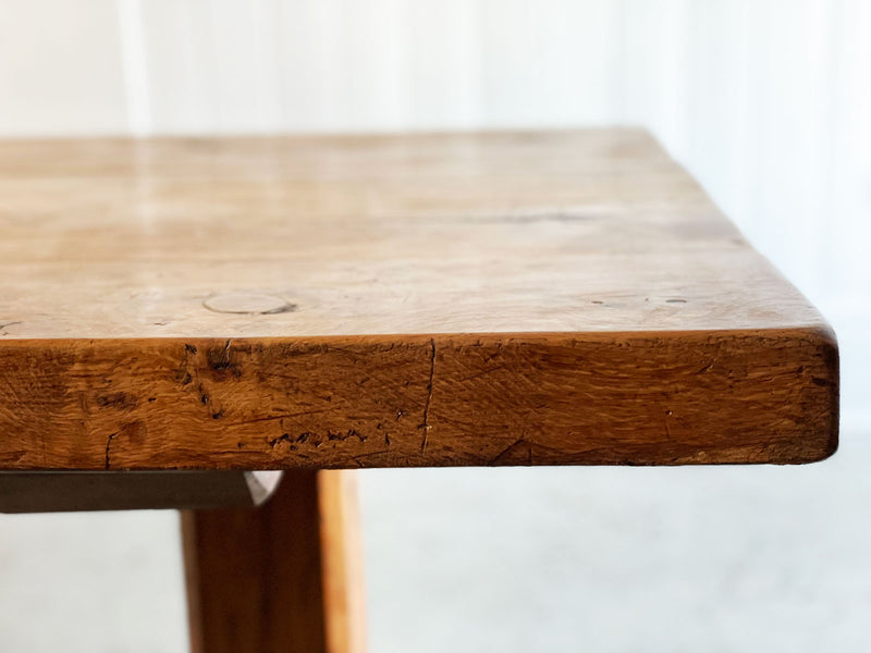 An early 20th Century French Oak Trestle Table