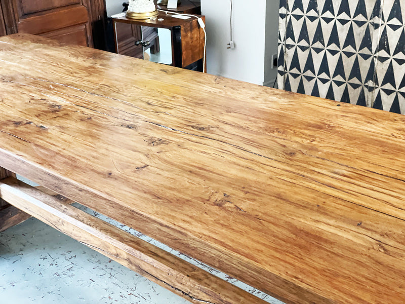 An early 20th Century French Oak Trestle Table