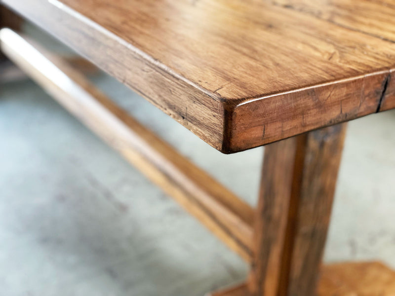 An early 20th Century French Oak Trestle Table