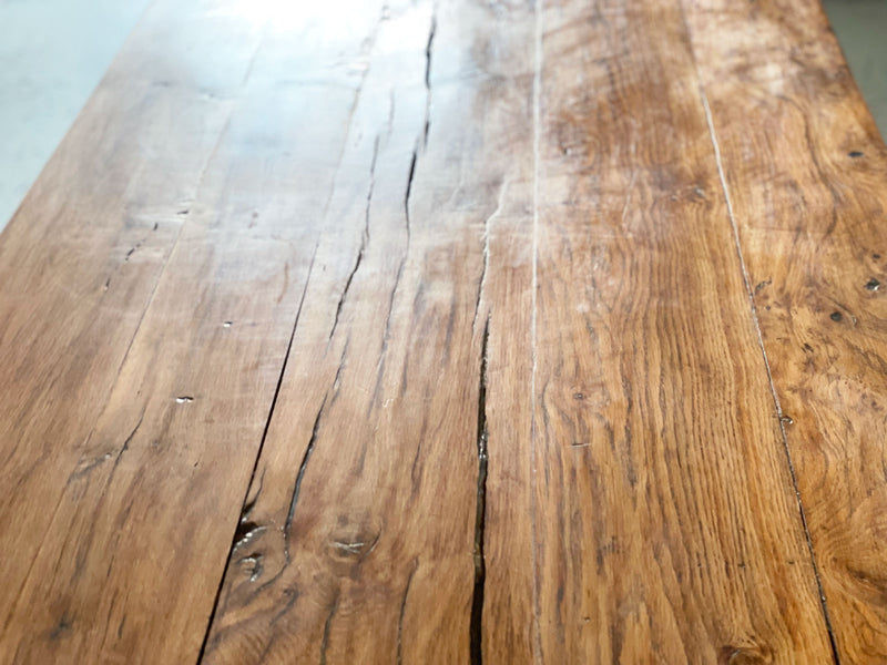 An early 20th Century French Oak Trestle Table