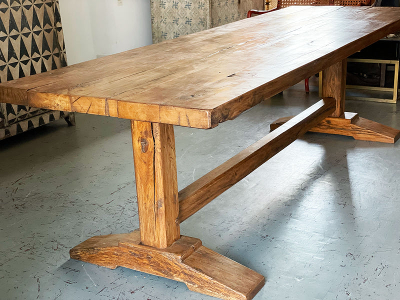 An early 20th Century French Oak Trestle Table