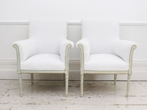 A Pair of Painted Scroll Back Antique French Armchairs