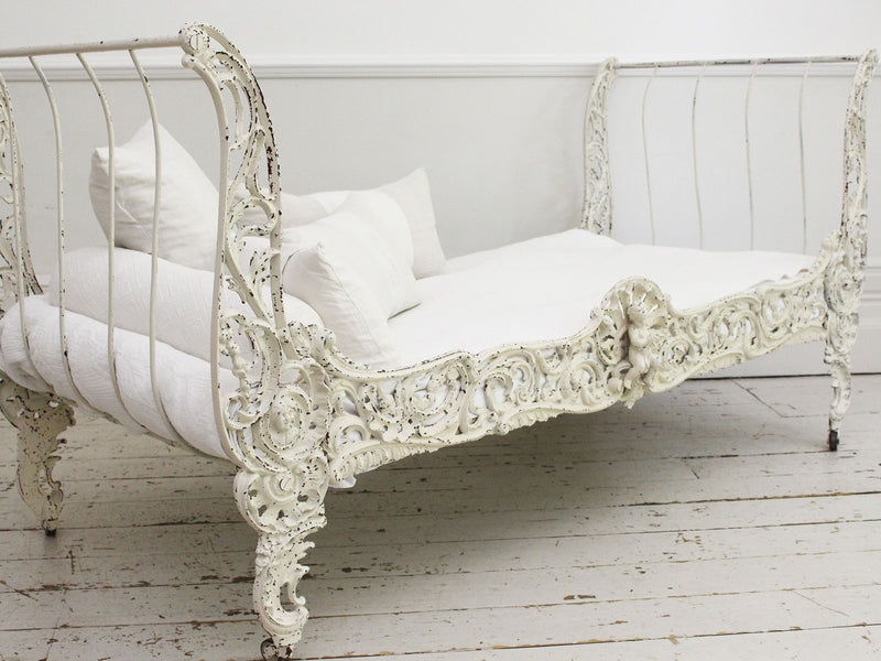 An Ornate 19th Century French Painted White Metal Daybed