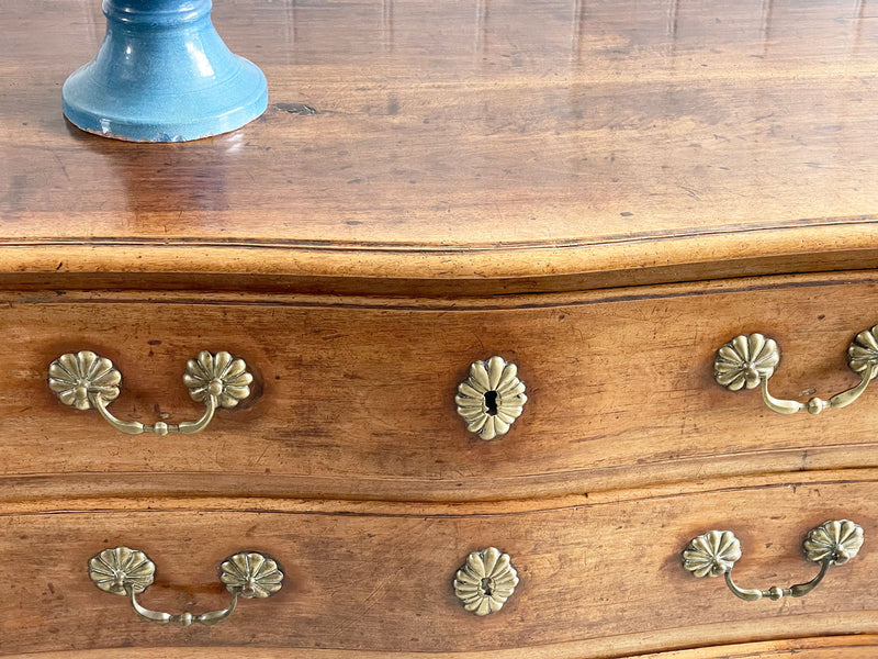A Louis XV Walnut Serpentine Fronted Commode