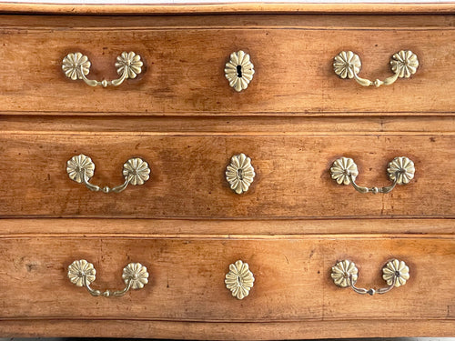 A Louis XV Walnut Serpentine Fronted Commode