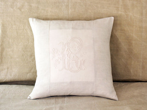 An antique French linen monogrammed 50cm square cushion - initials RC