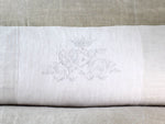 A rare antique monogram 'VC' with crown on linen bolster by Charlotte Casadéjus