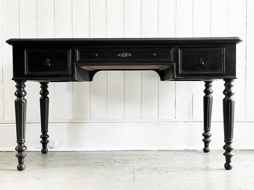 A Napoleon III Ebonised Writing Desk with Leather Top