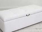 A 19th Century French Ottoman with Antique White Linen Covering