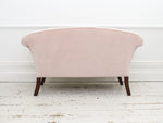 A Sabre Legged Regency Sofa Upholstered in Pale Blush Velvet