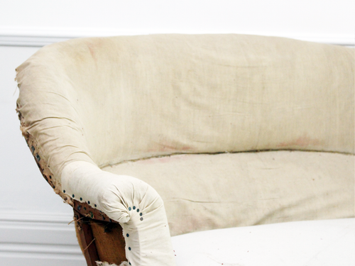 An Antique French 19th Century Sofa with Curved Back