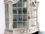 An 18th Century Limed Oak Serpentine Fronted Bruges Vitrine with Pale Blue Interior