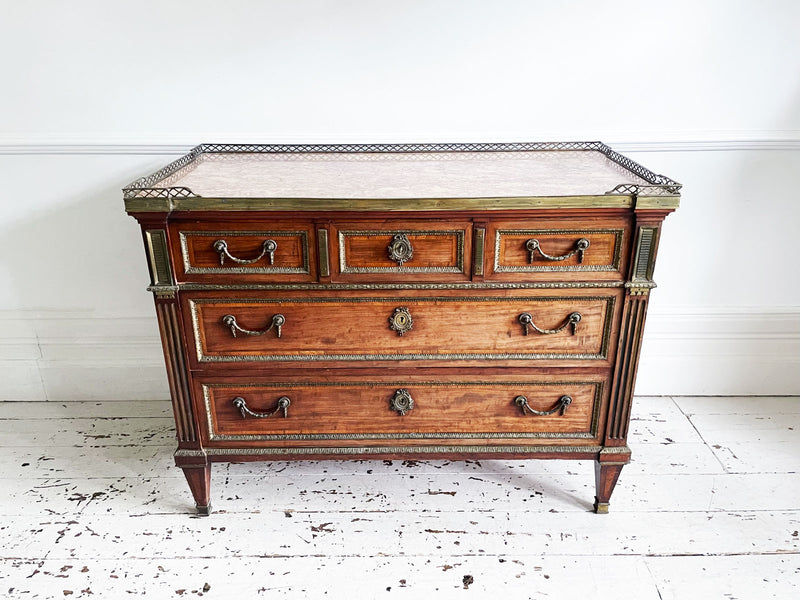 A Majestic Louis XVI Mahogany and Brass Commode