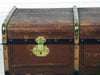 A Large brown canvas and wood trunk