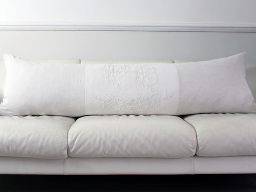 Antique monogram on linen bolster 'FD' by Charlotte Casadéjus