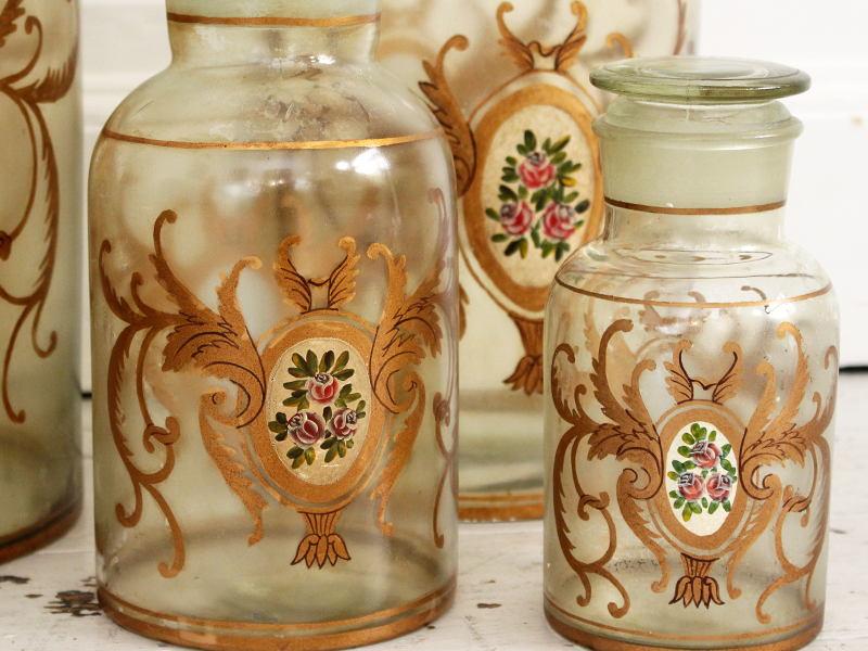 A set of 7 hand painted French apothecary jars