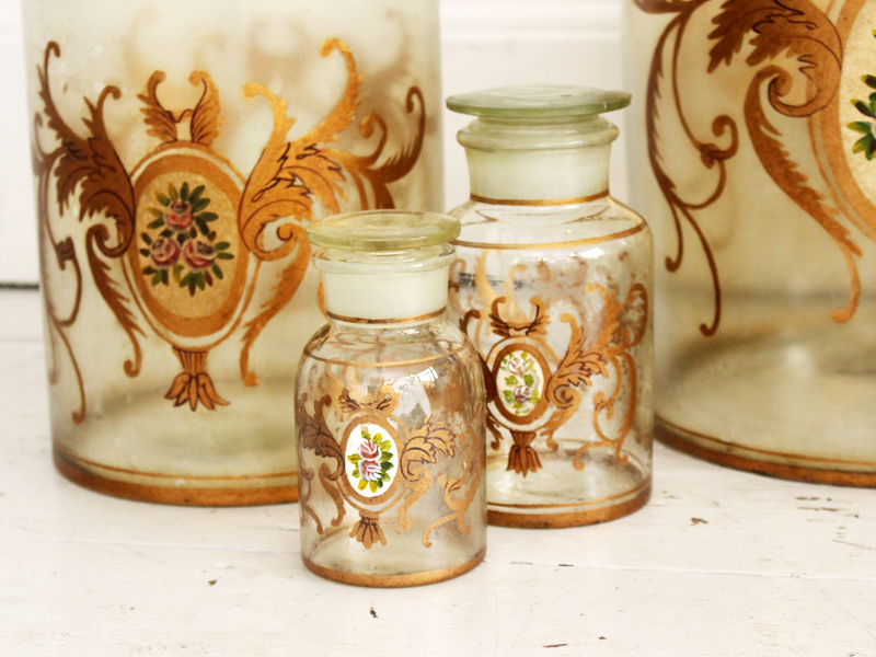 A set of 7 hand painted French apothecary jars
