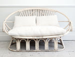A 1950's French White Bamboo Sofa with Antique Linen Cushions
