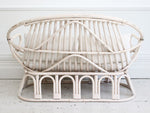 A 1950's French White Bamboo Sofa with Antique Linen Cushions