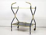 A chic 1970's French black & brass drinks trolley
