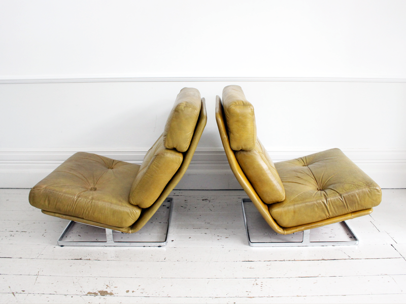A Pair of large Tetrad 'Nucleus' Leather & Chrome Low Chairs