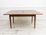 A 1970's French Portfeuille Walnut Dining Table