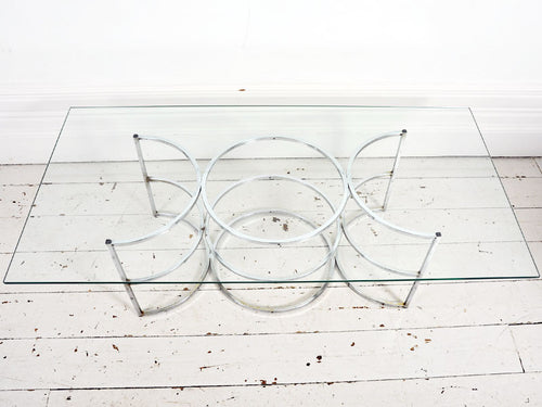 A 1960's Coffee Table with chrome circle base & glass top
