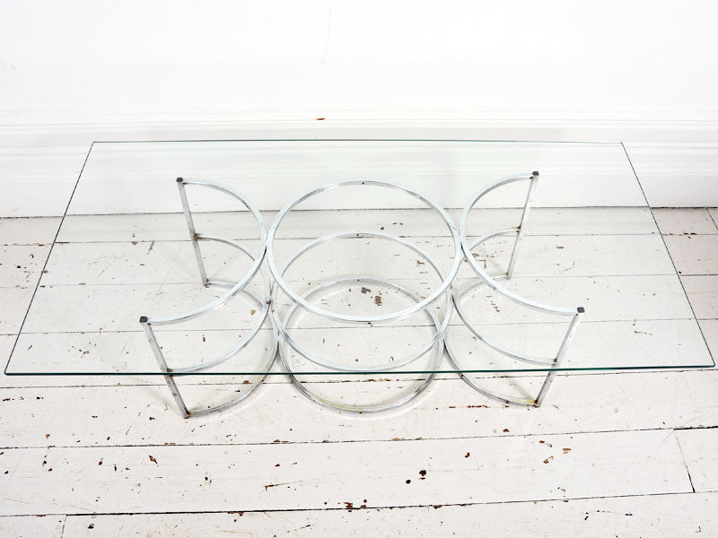 A 1960's Coffee Table with chrome circle base & glass top