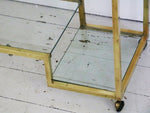 An elegant Italian brass and glass 1970's console table