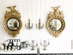 A Pair of 1950's Empire Style French Two Light Gilt Bronze Sconces