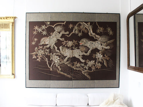 A Meiji Period Silverwork Embroidered Four Panel Screen Depicting Mythical Shishi