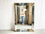 An Impressive French Art Deco Cushion Mirror with Brass Detailing