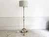 A 1950's French Brass and Glass Standing Lamp with Tripod Base