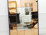 A Large Mid Century French Mirror with Amber Mirror and Ebonised Surround