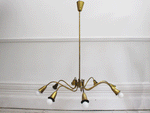 A Mid Century Italian Eight Arm Brass Plated Pendant Light