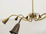 A Mid Century Italian Eight Arm Brass Plated Pendant Light