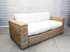 A Large French 1970's Rattan Sofa with White Linen & Feather Cushions