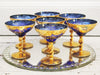 A Set of 7 Ornately Decorated Blue 1950's Murano Champagne Coupes