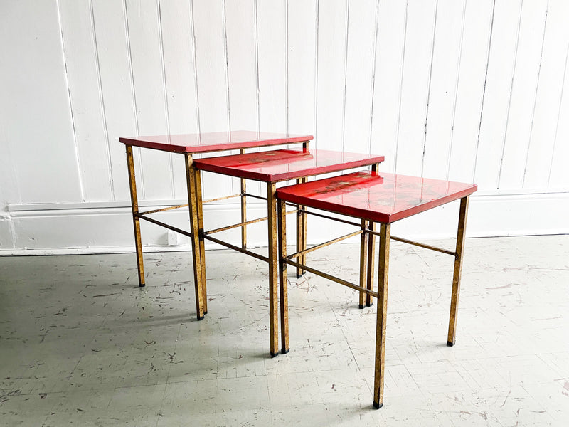 A 1950's Red Lacquered Chinoiserie Nest of Tables